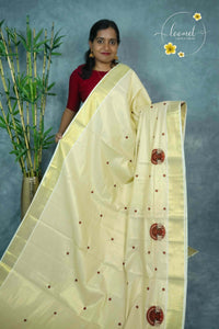 ZS1920 Light Gold Cotton Tissue saree with  Theyyam embroidery motifs